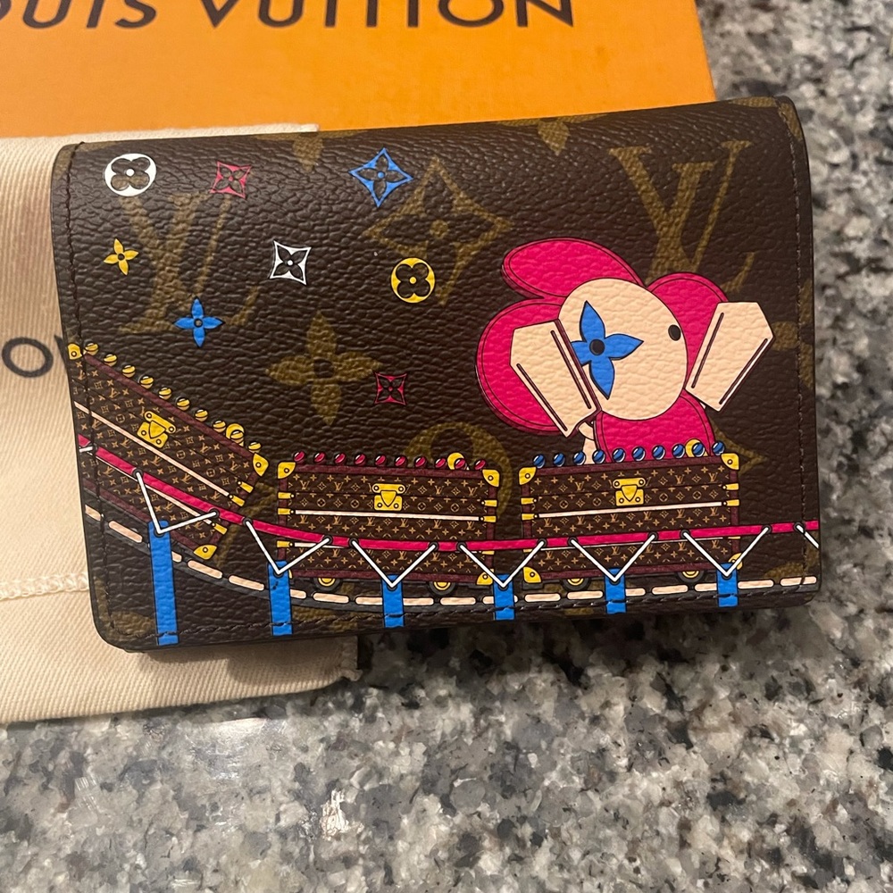 Auth. LOUIS VUITTON Victorine Vivienne wallet!NWT